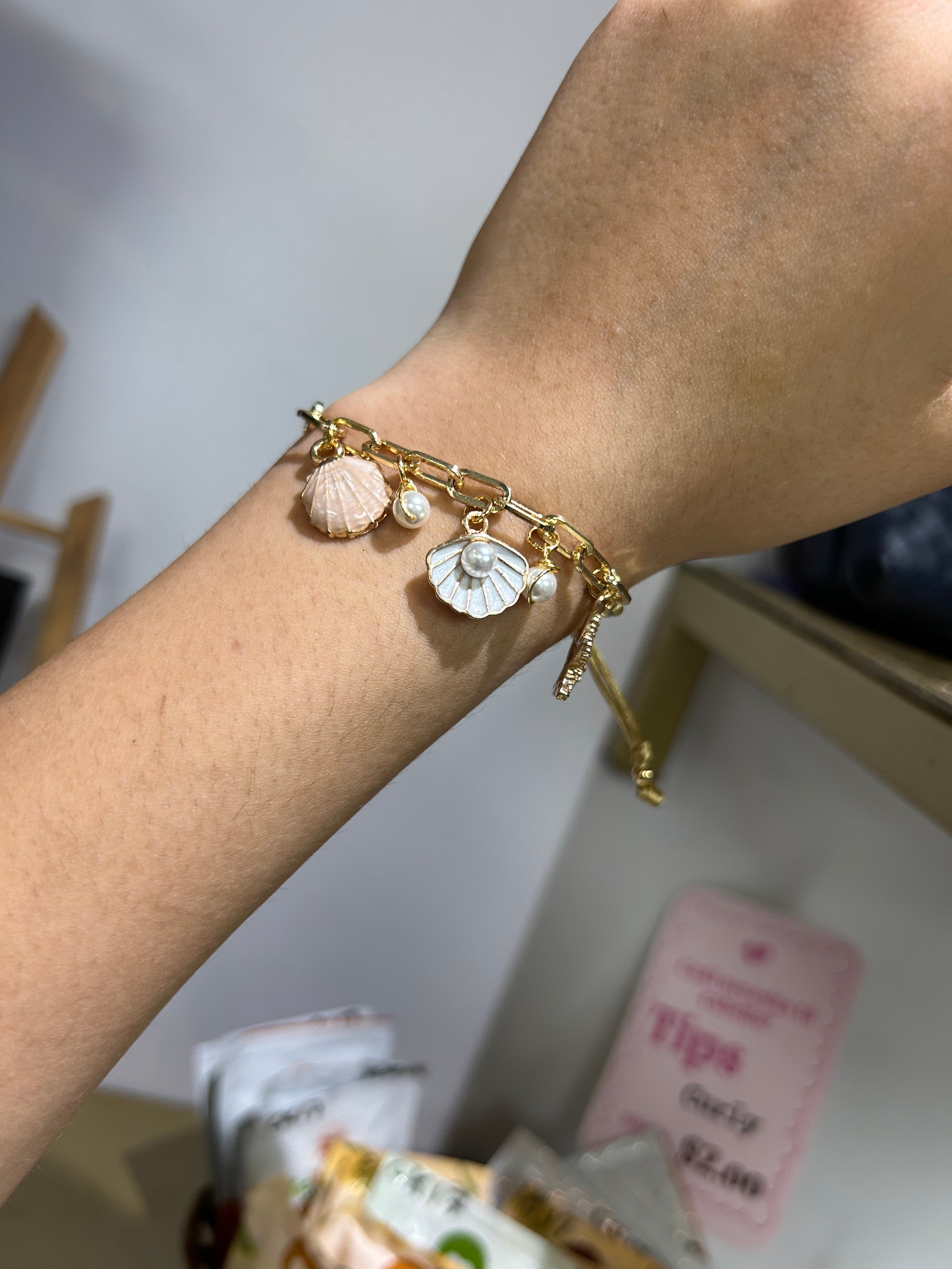 Pulsera de dijes marinos