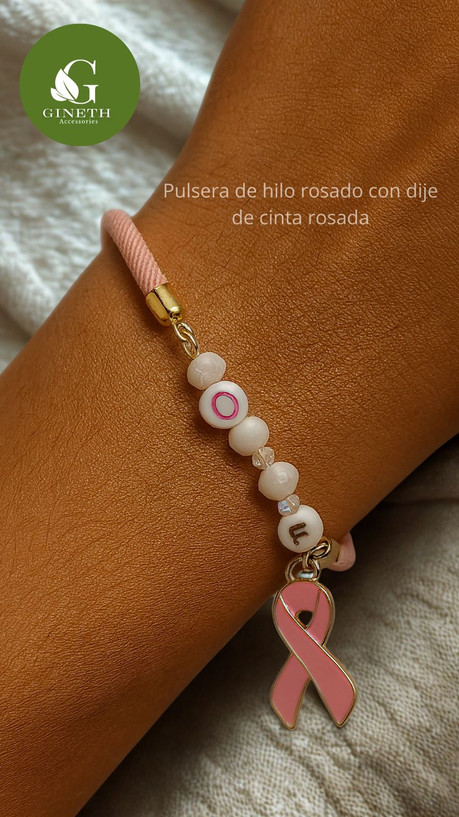 Pulsera de Hilo Rosado con Dije de Cinta Rosada